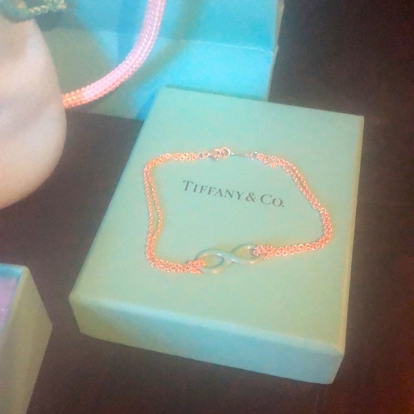 Tiffany & Co. Jewelry - Tiffany & Co blue enamel infinity bracelet 925 silver in box, pouch & bag
